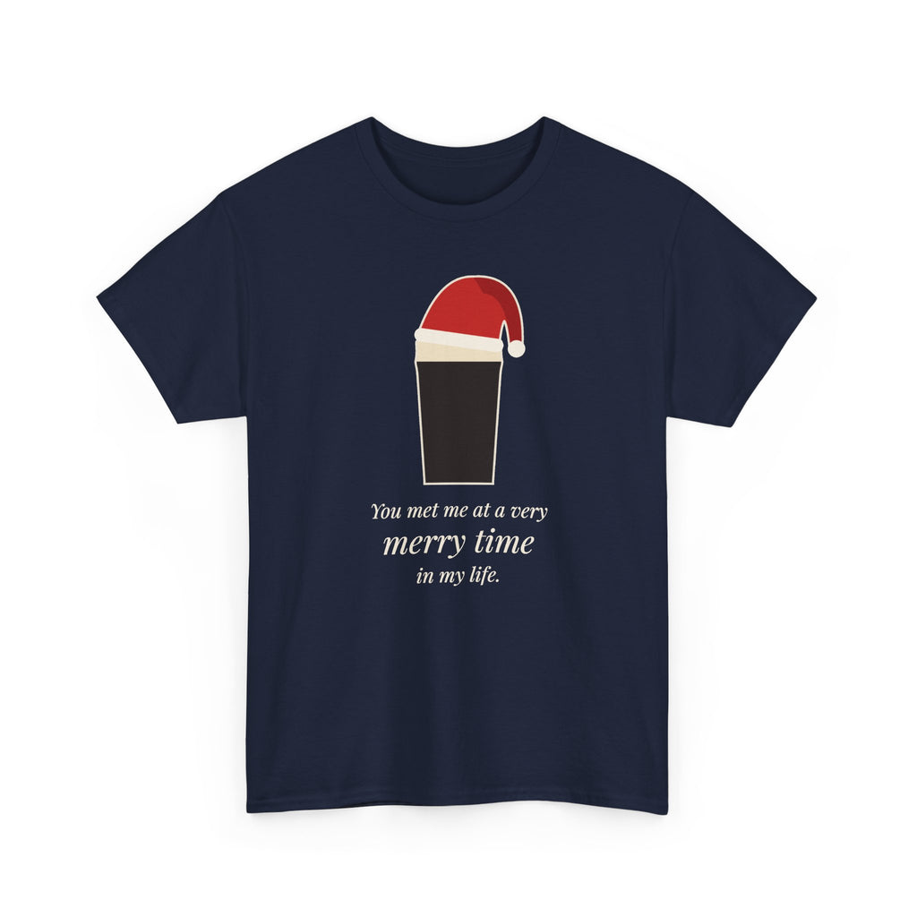 Merry Time Tee in Navy: front, a pint wearing a Santa hat above the line 'You met me at a very merry time in my life.'